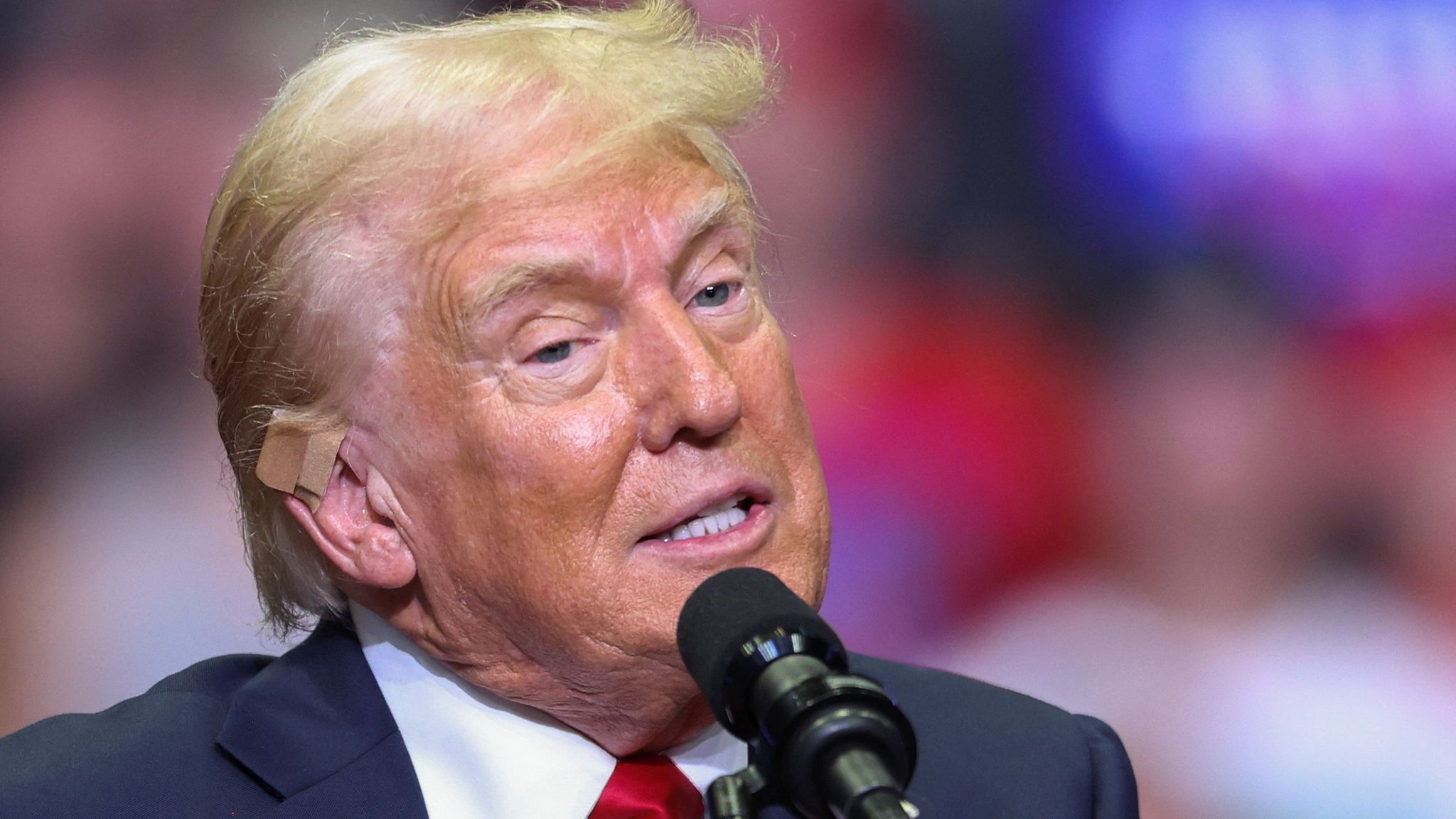 Trump Claims He Took a Bullet for Democracy at Michigan Rally